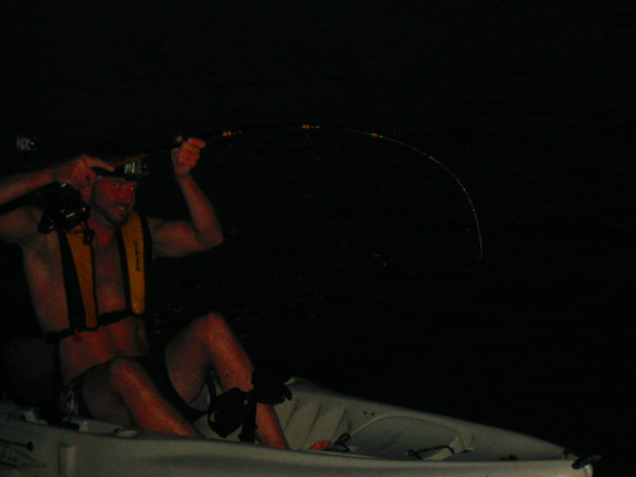 night kayak fishing for striped bass